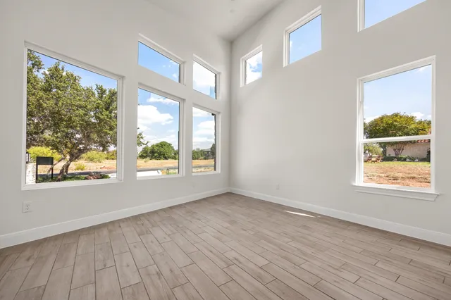 a view of an empty room and window
