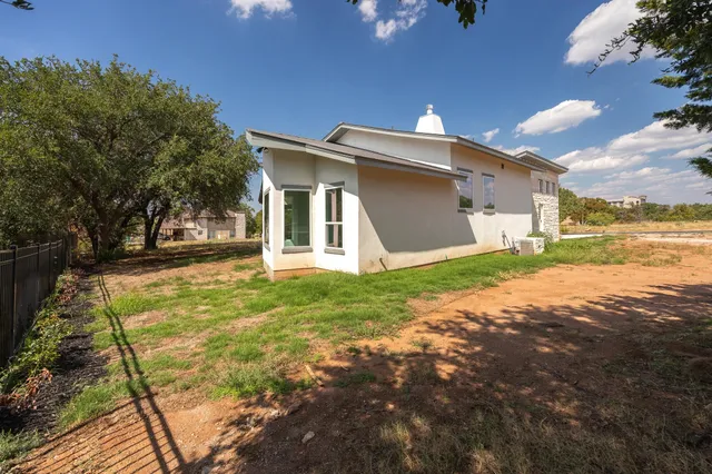 a front view of house with yard