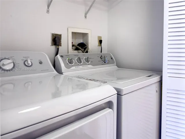a view of utility room with washer and dryer