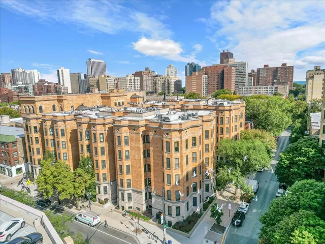 a view of a building with a yard