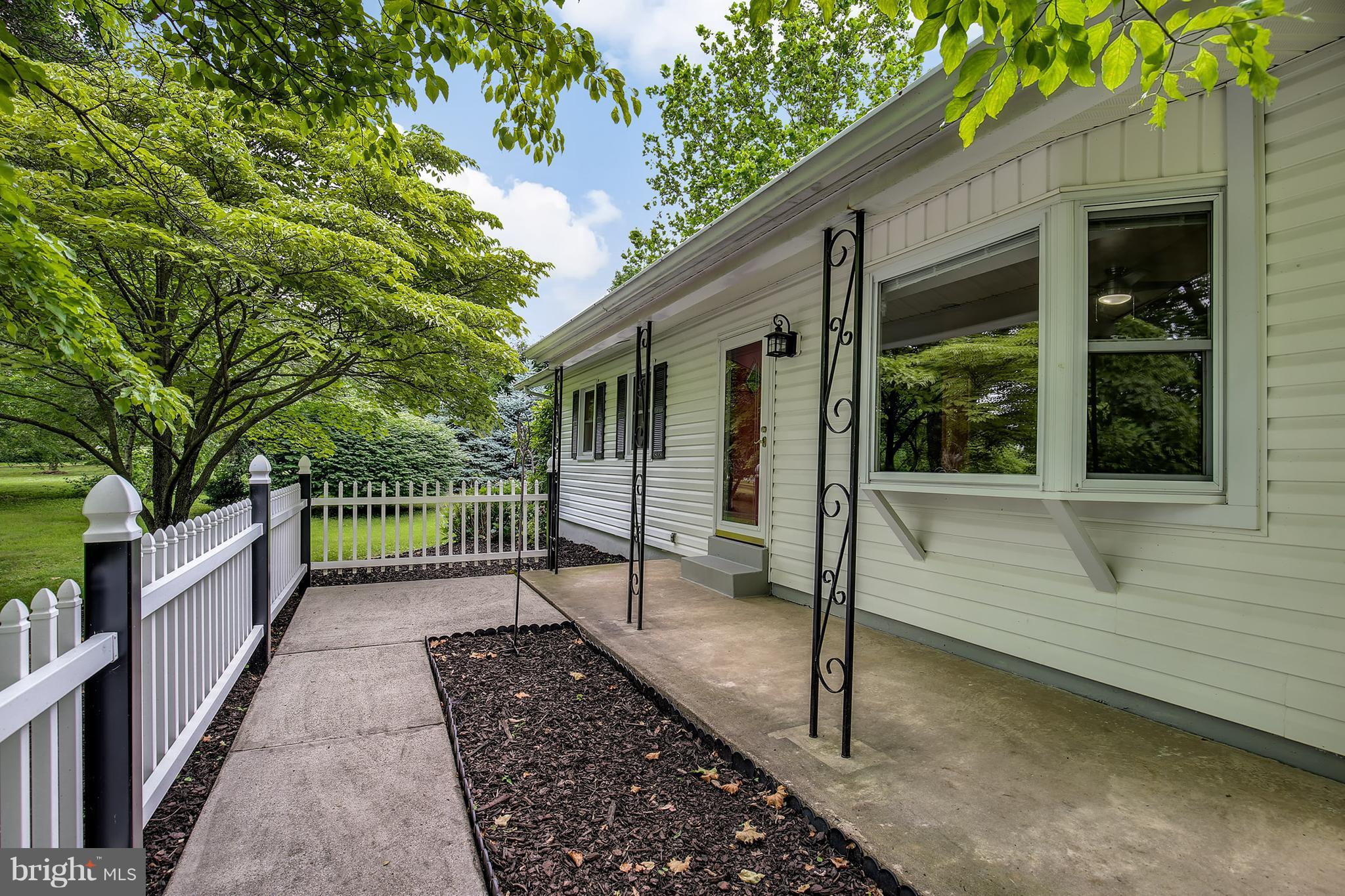 15833 Barnesville Road Boyds, MD 20841 - Photo 3 of 30 a view of a pathway with a house