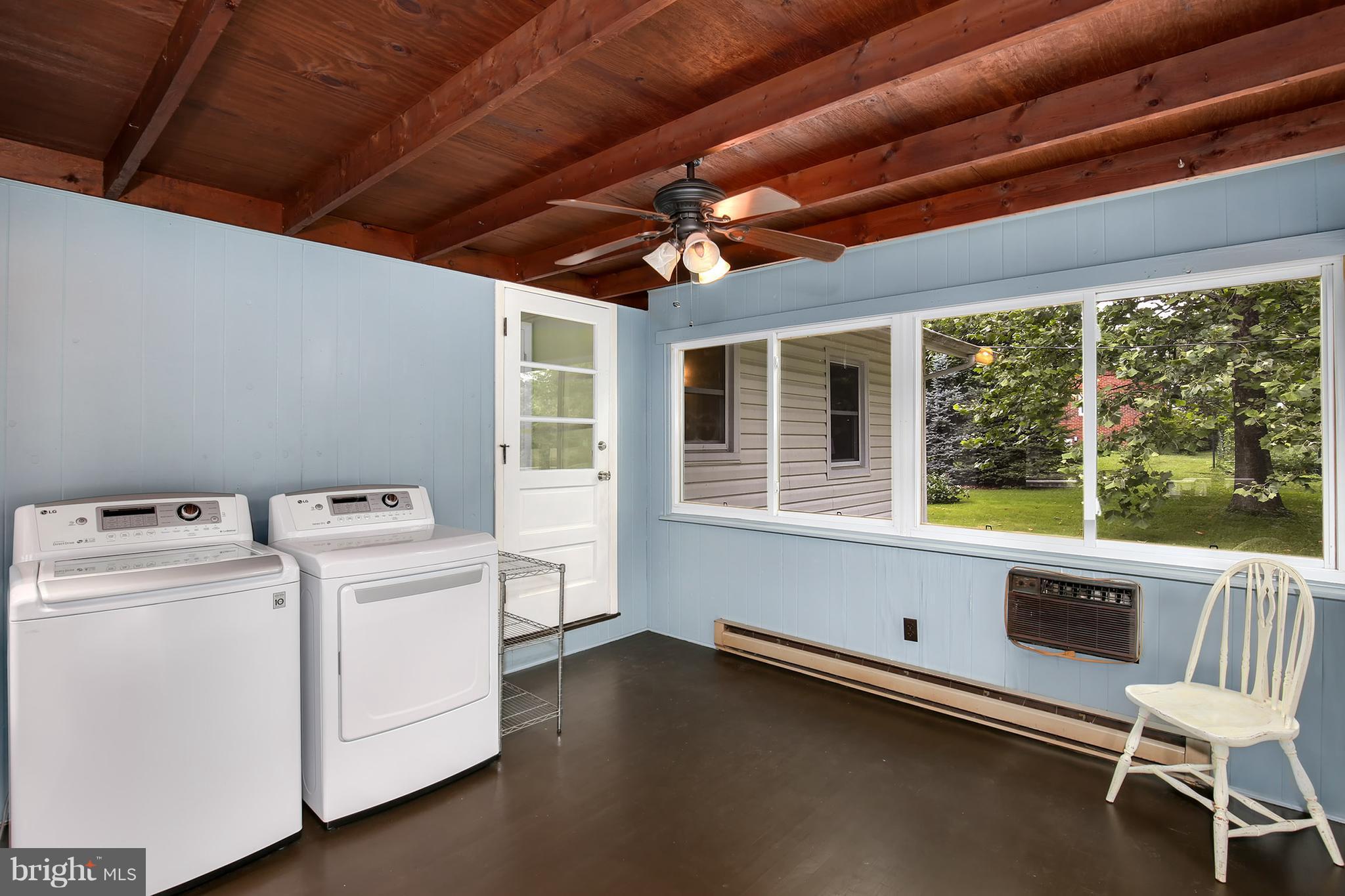 15833 Barnesville Road Boyds, MD 20841 - Photo 22 of 30 a view of storage and utility room with washer and dryer