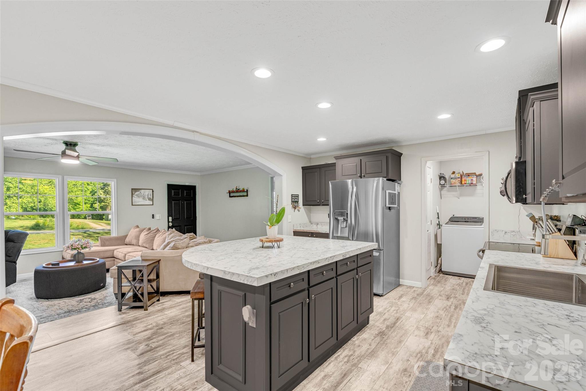 5007 Carlos Road Catawba, NC 28609 - Photo 11 of 29 a living room with stainless steel appliances granite countertop furniture and a kitchen
