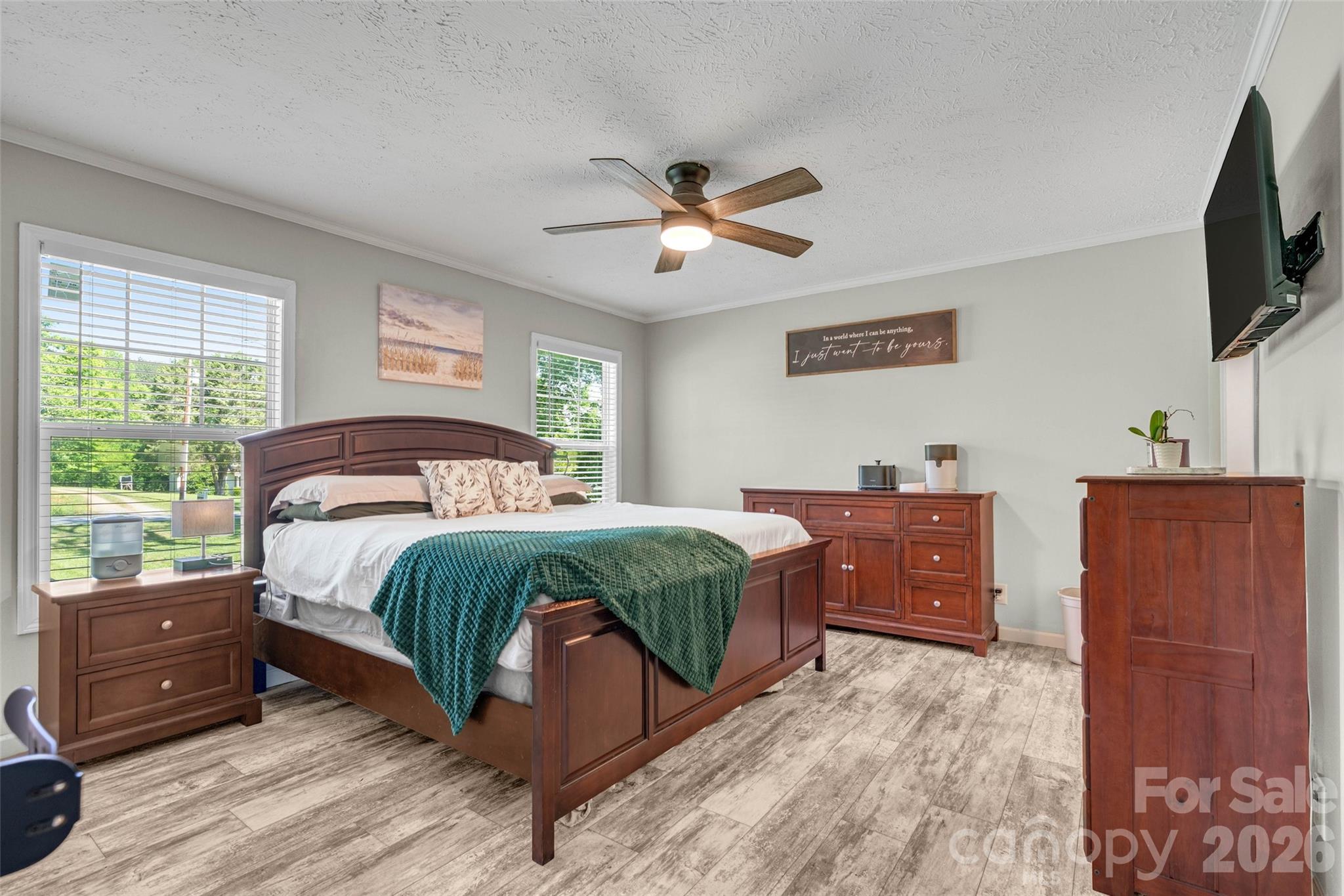 5007 Carlos Road Catawba, NC 28609 - Photo 18 of 29 a bedroom with a bed and a flat screen tv