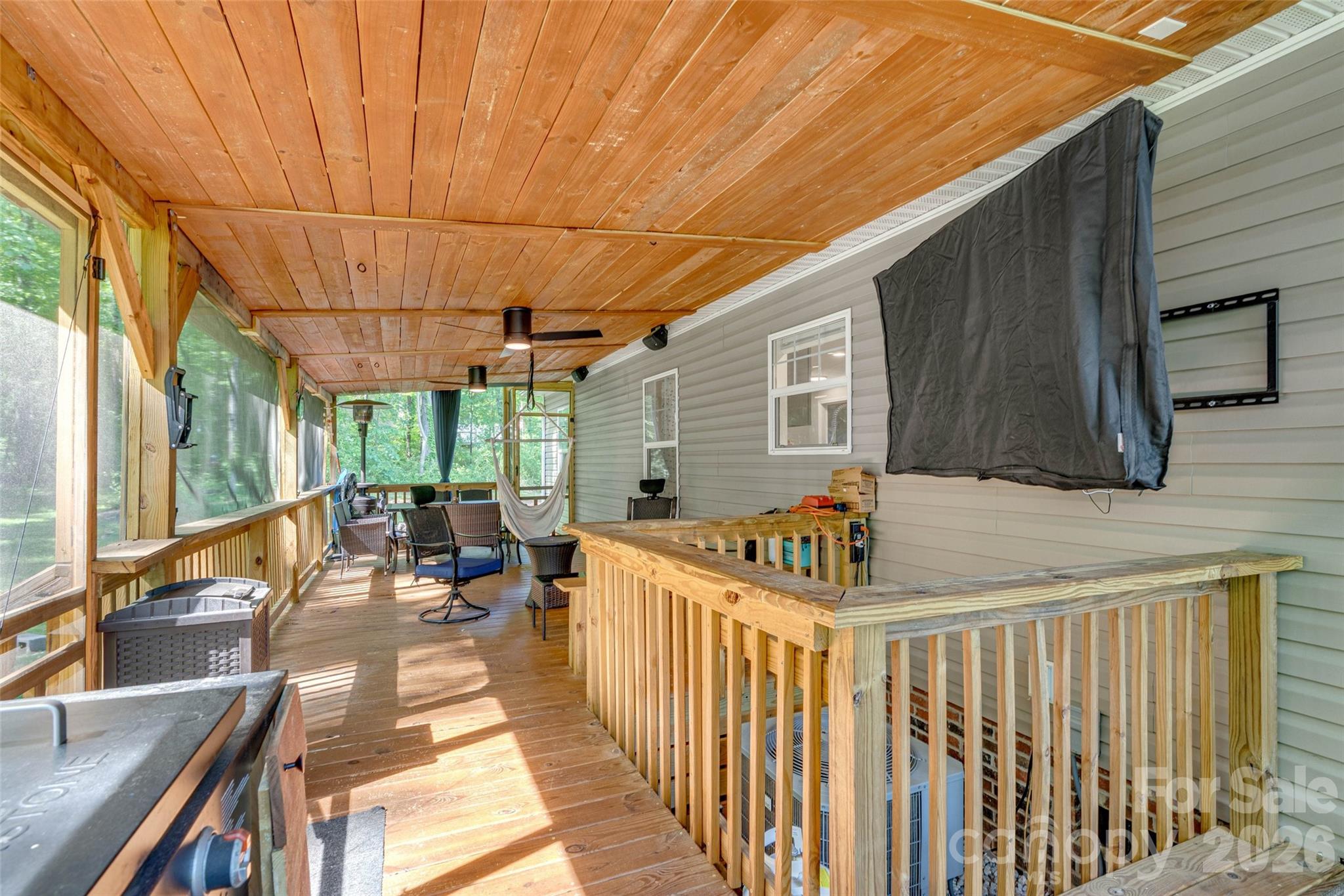 5007 Carlos Road Catawba, NC 28609 - Photo 25 of 29 a view of a patio with table and chairs with wooden floor and fence