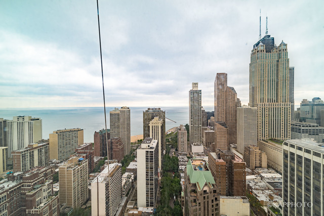 1030 North State Street, Unit 40G Chicago, IL 60610 - Photo 9 of 20 a city view with lot of high rise buildings