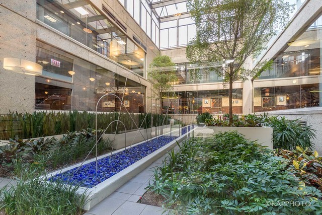 1030 North State Street, Unit 40G Chicago, IL 60610 - Photo 10 of 20 a view of garden with patio