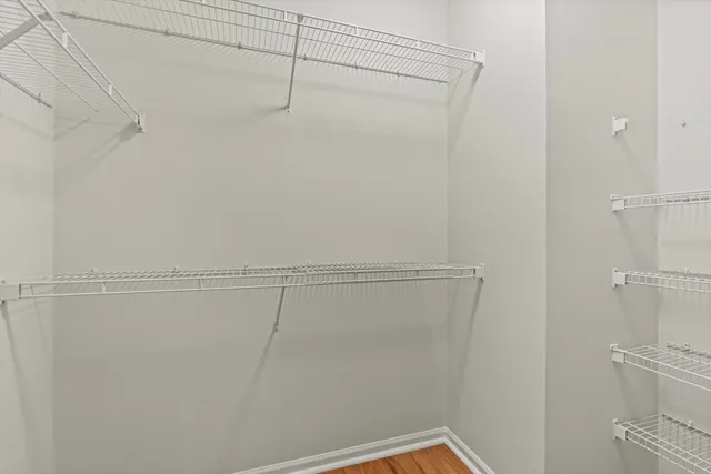 a view of a room with racks on the wall