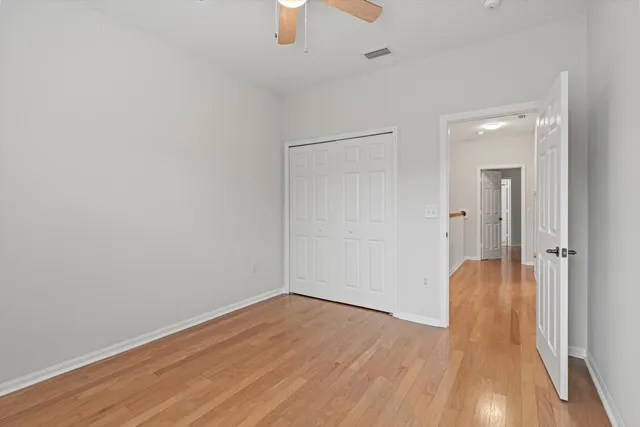 a view of a livingroom with wooden floor