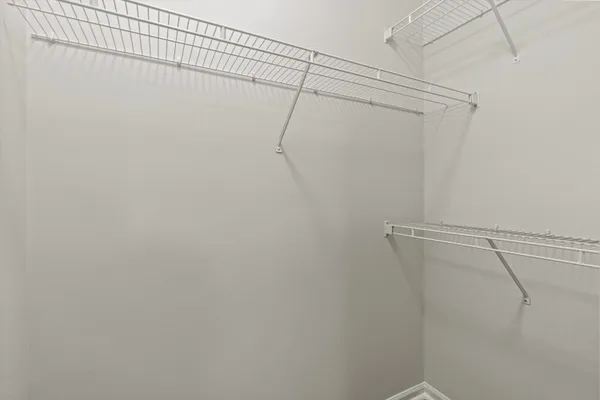 a view of a room with racks on the wall
