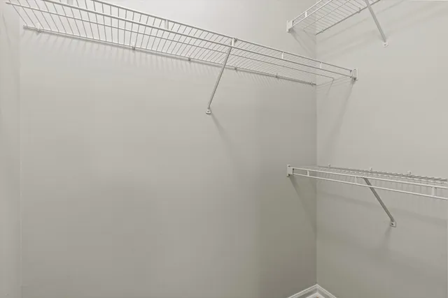 a view of a room with racks on the wall