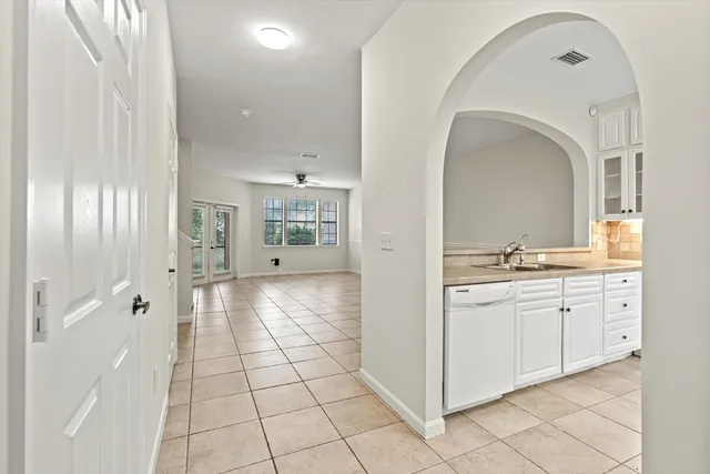 a bathroom with a sink a mirror and a shower