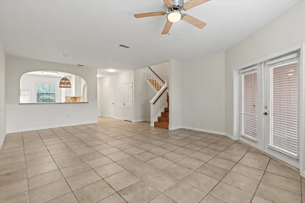 a view of an empty room and window