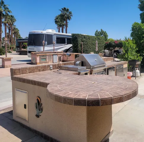 a view of a patio with swimming pool