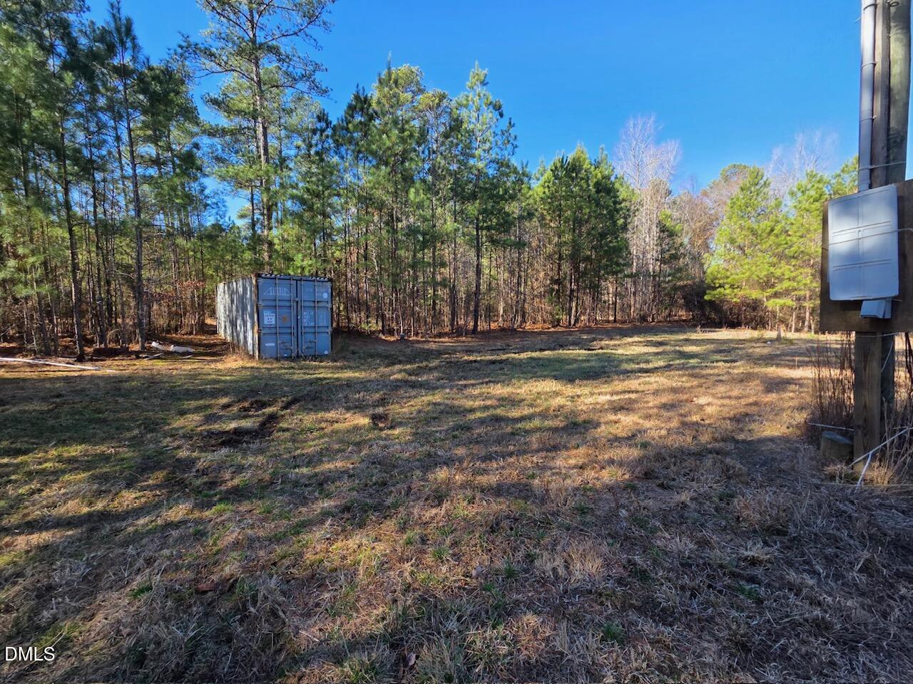 1061 Rogers Quarter Road Creedmoor, NC 27522 - Photo 6 of 11 a view of a yard with an outdoor space