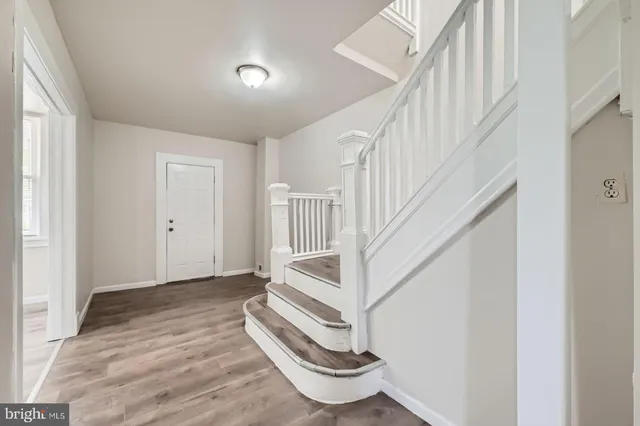 a view of a hallway with staircase