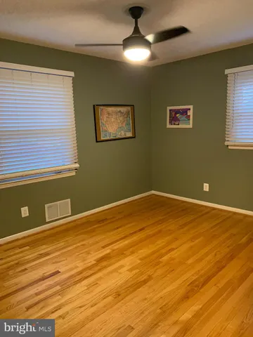 a view of a room that has a window