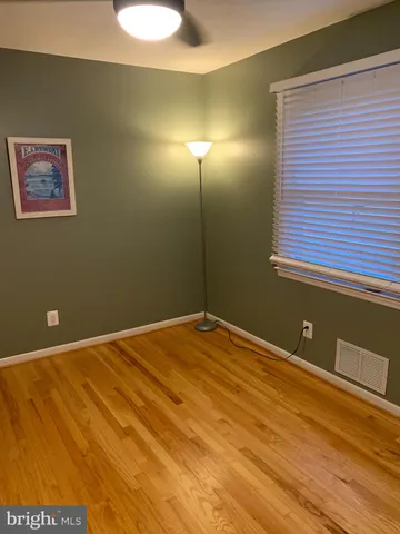 a kitchen with stainless steel appliances granite countertop a sink stove and microwave