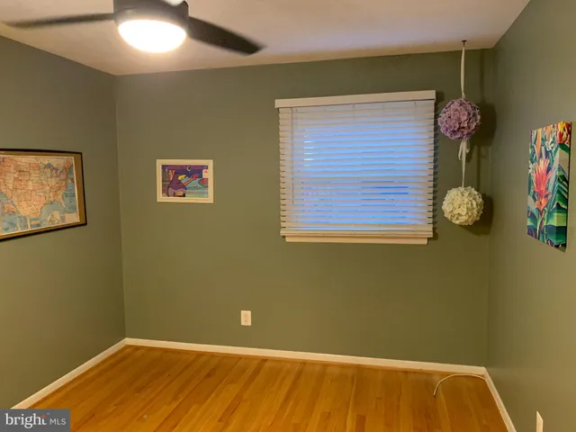 a kitchen with a sink cabinets and window