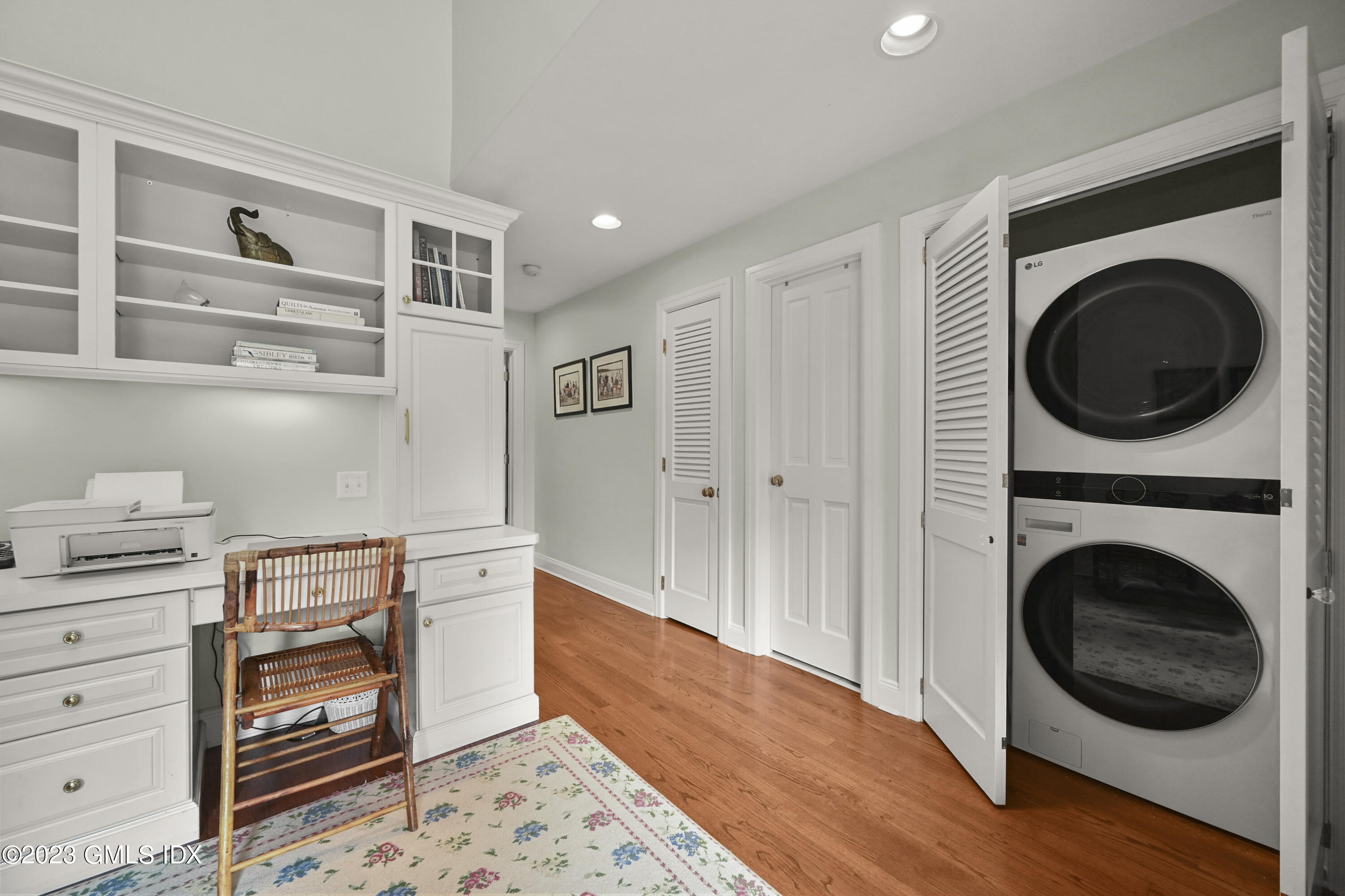 333 Palmer Hill Road, Unit 3B Riverside, CT 06878 - Photo 16 of 31 a view of a bedroom with washer and dryer