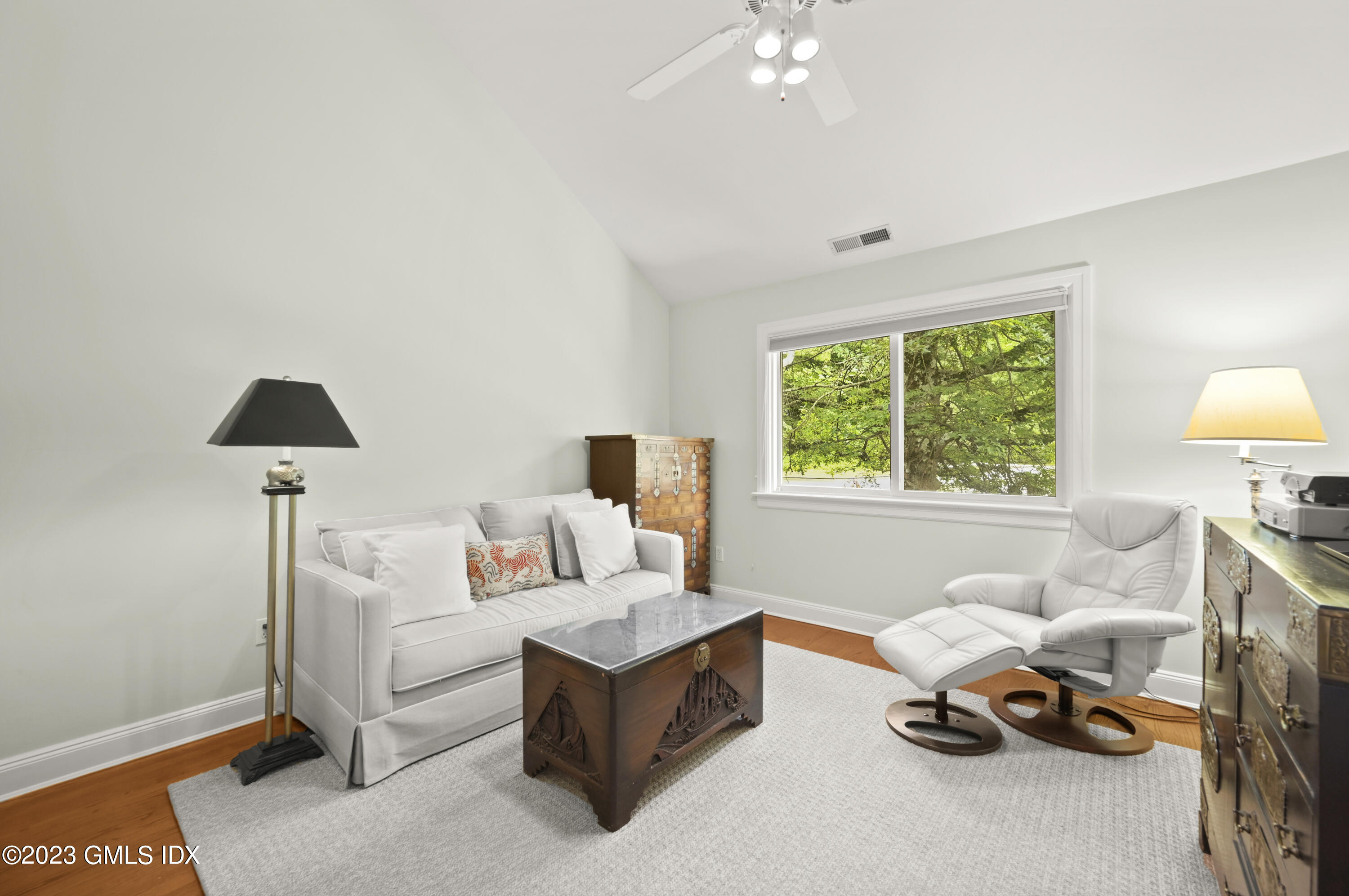 333 Palmer Hill Road, Unit 3B Riverside, CT 06878 - Photo 22 of 31 a living room with furniture and a window