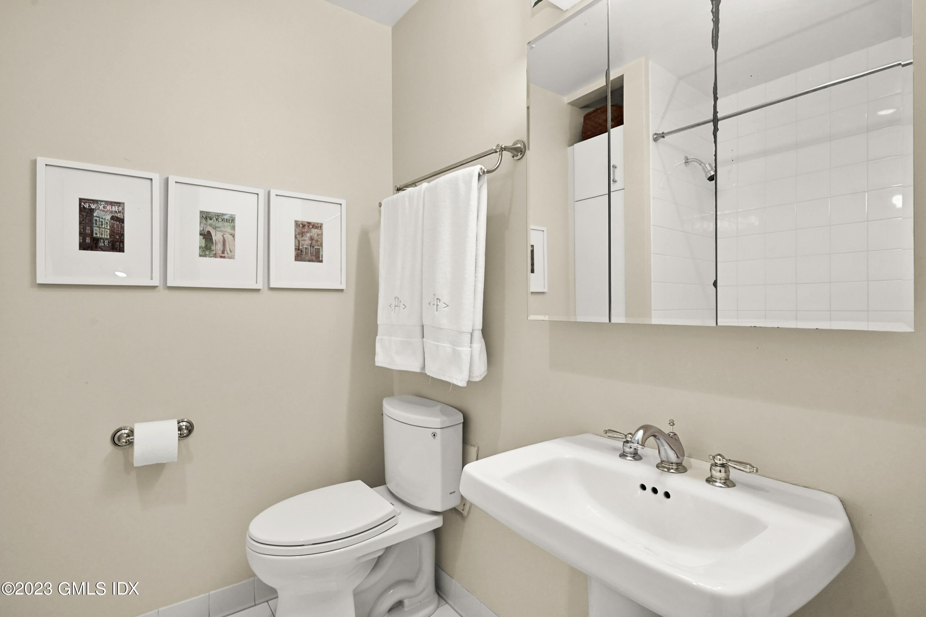 333 Palmer Hill Road, Unit 3B Riverside, CT 06878 - Photo 24 of 31 a bathroom with a sink a toilet and a mirror