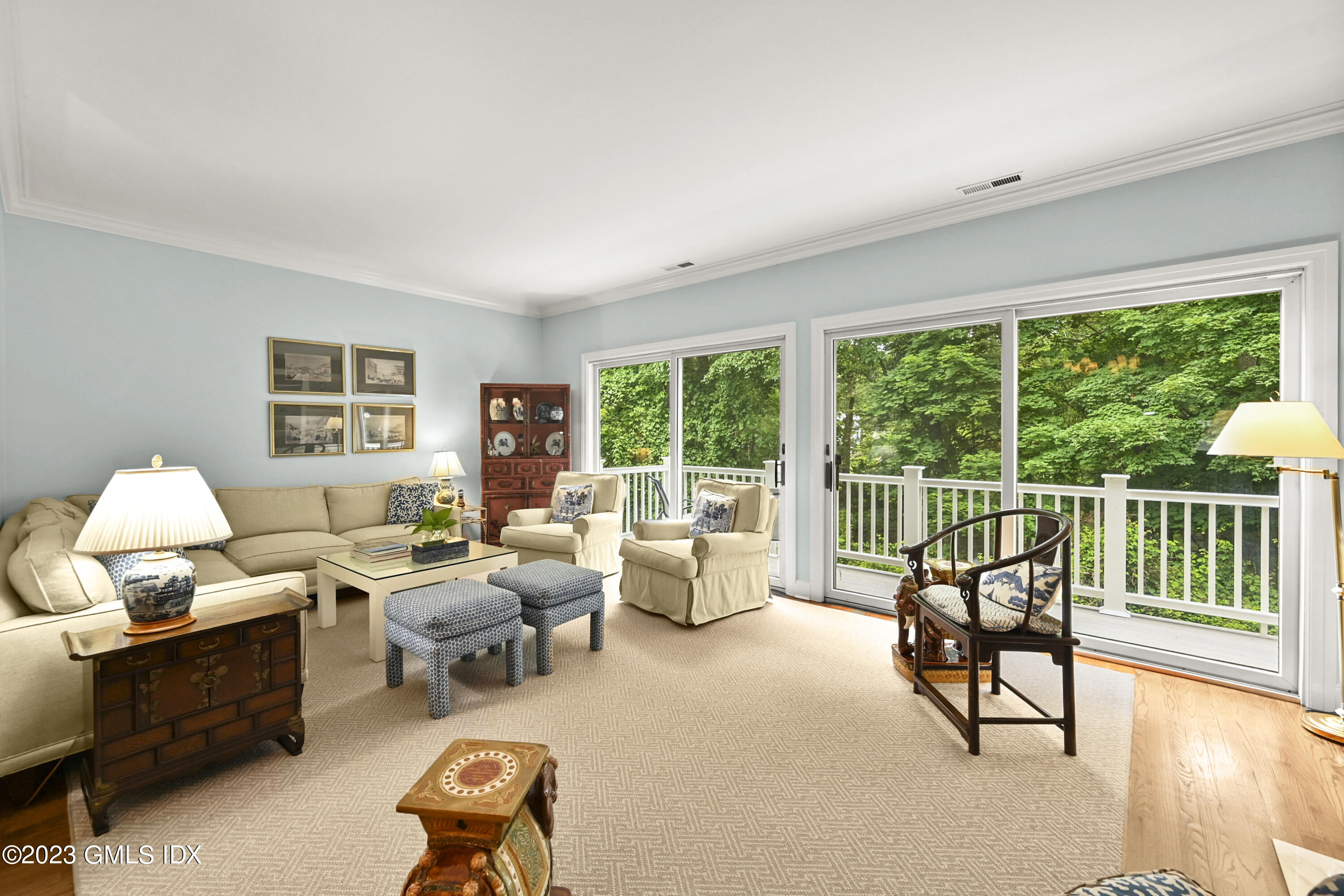 333 Palmer Hill Road, Unit 3B Riverside, CT 06878 - Photo 4 of 31 a living room with furniture and a large window
