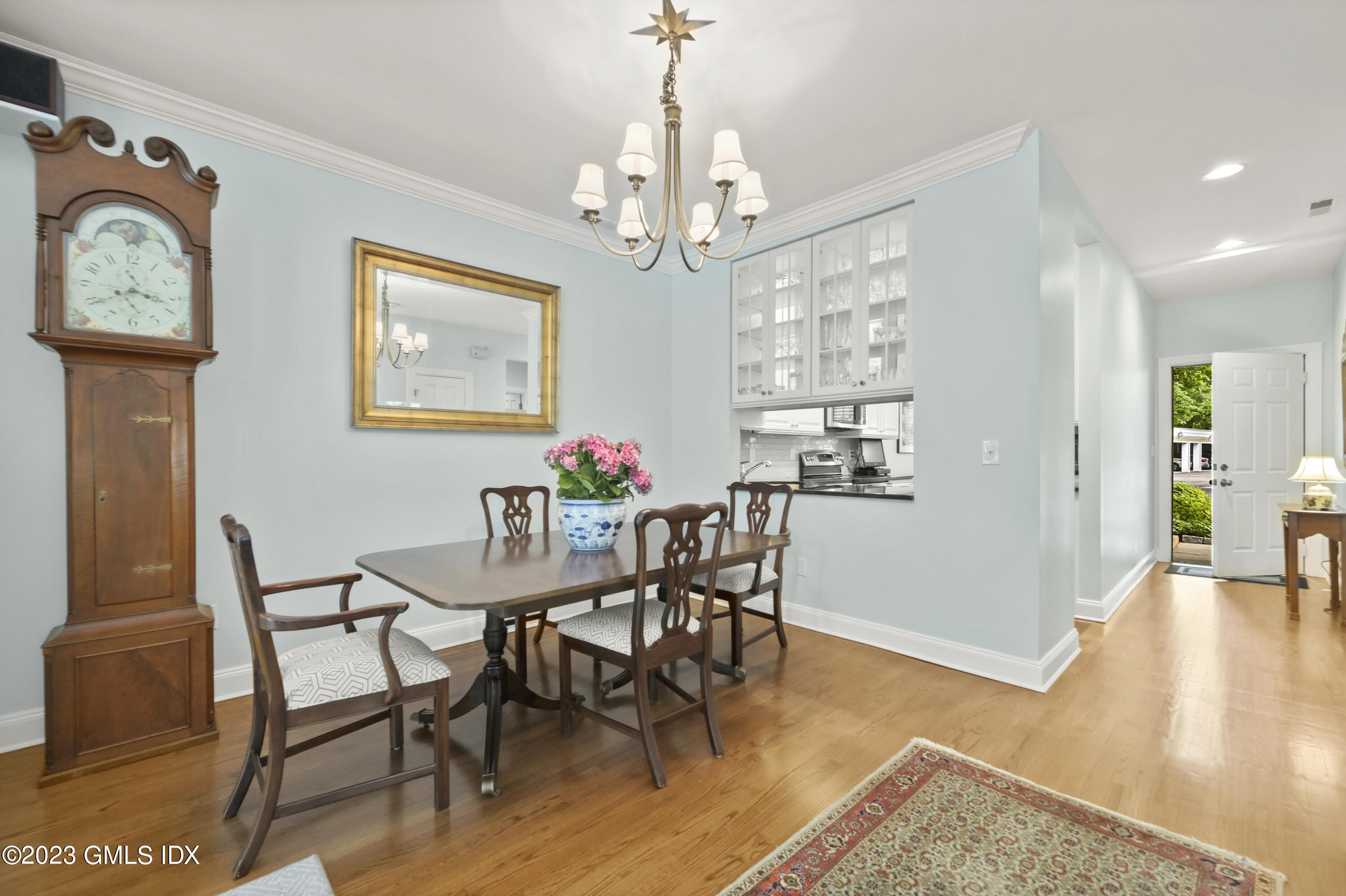 333 Palmer Hill Road, Unit 3B Riverside, CT 06878 - Photo 9 of 31 a view of a dining room with furniture and wooden floor