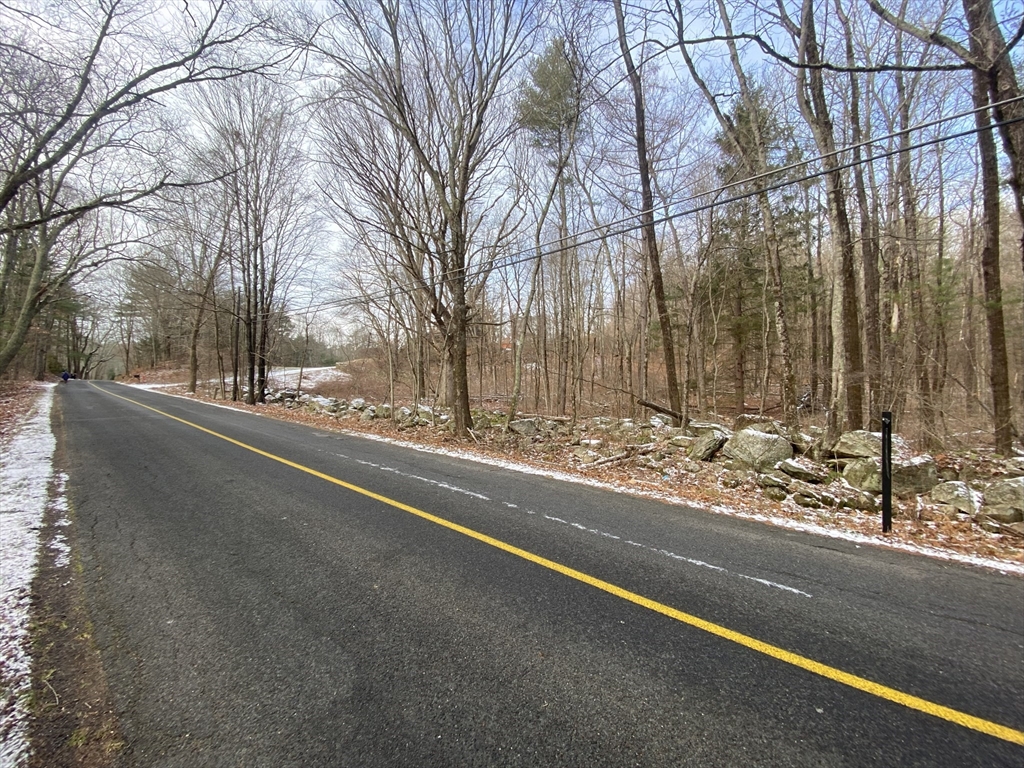 0 Oxbow Road Charlton, MA 01507 - Photo 4 of 18 a view of a street with a large tree