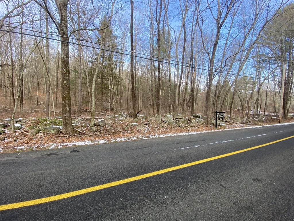 0 Oxbow Road Charlton, MA 01507 - Photo 5 of 18 a view of a street with a building in the background