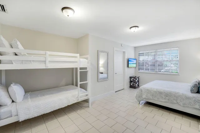 a bedroom with furniture and a couch