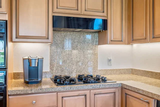 a view of a golf course with a lake view