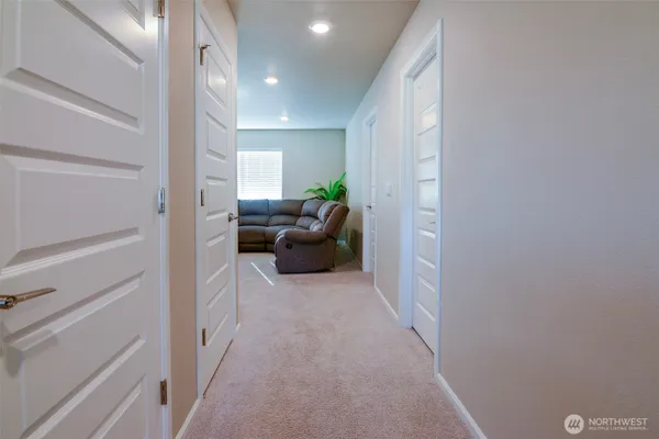 a living room with furniture and a window