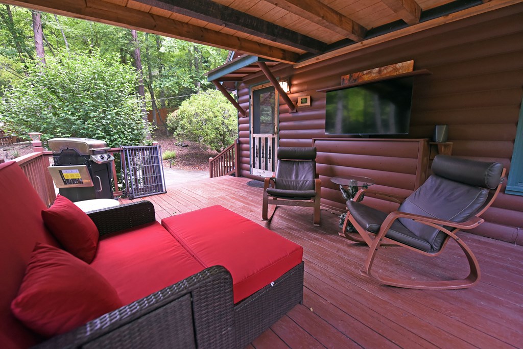 789 Old Mill Pond Road Mineral Bluff, GA 30559 - Photo 14 of 59 a outdoor space with patio the couches and pool