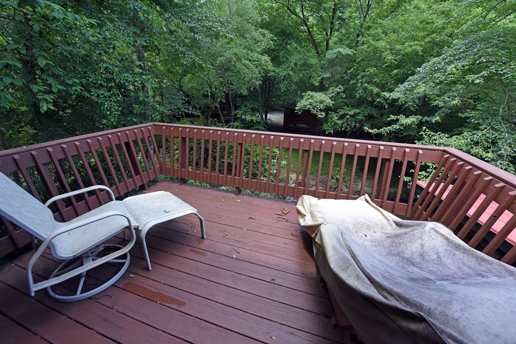 789 Old Mill Pond Road Mineral Bluff, GA 30559 - Photo 44 of 59 a view of a wooden deck with furniture