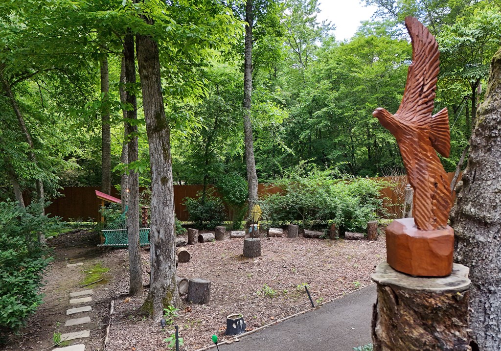 789 Old Mill Pond Road Mineral Bluff, GA 30559 - Photo 46 of 59 a view of a patio with chairs and plants