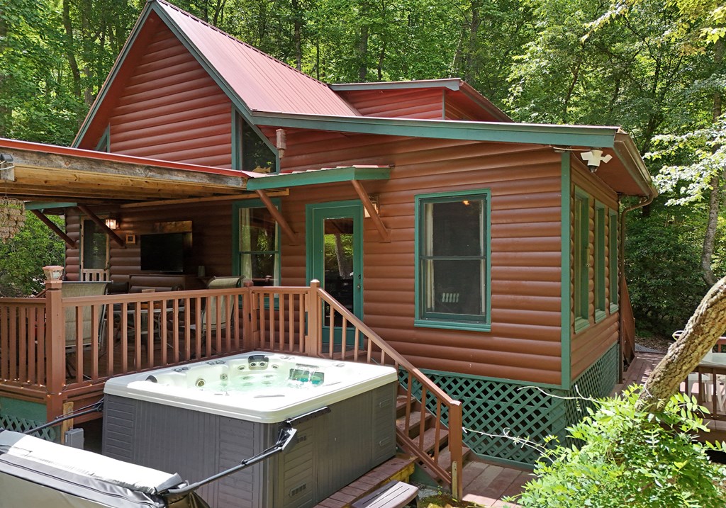 789 Old Mill Pond Road Mineral Bluff, GA 30559 - Photo 8 of 59 a view of a chairs and table in the balcony