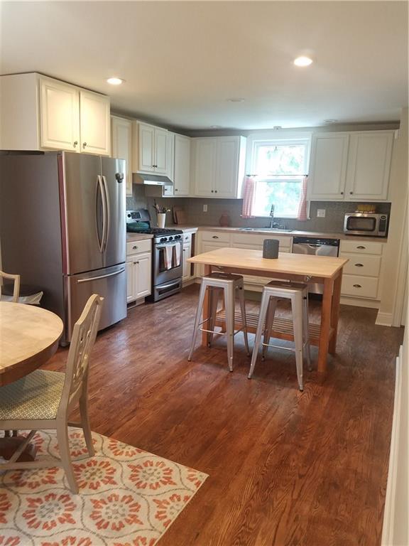 View of kitchen from eating area. Spacious and roomy. 
