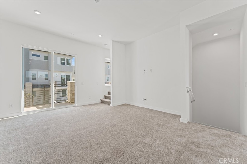 1822 West Bushell Street Anaheim, CA 92805 - Photo 9 of 34 an empty room with windows