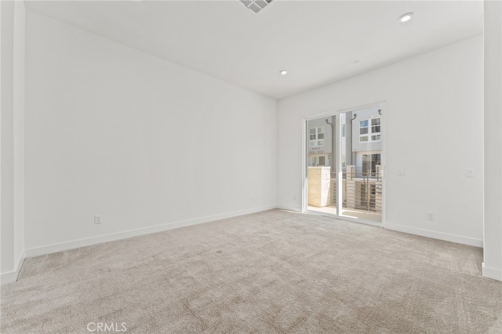 1822 West Bushell Street Anaheim, CA 92805 - Photo 10 of 34 an empty room with windows