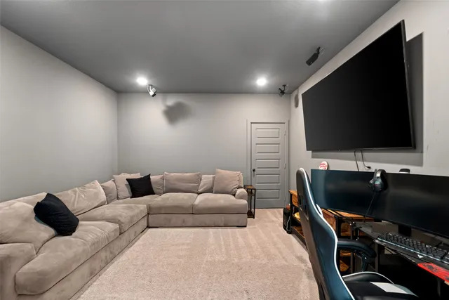 a view of a room with gaming equipment