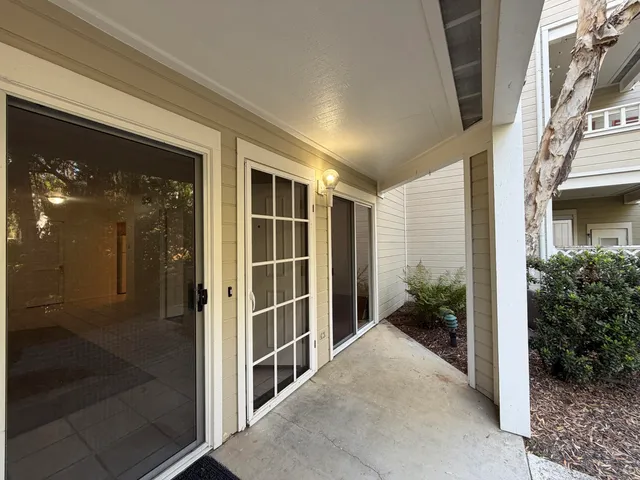 a kitchen with a sink stove and microwave