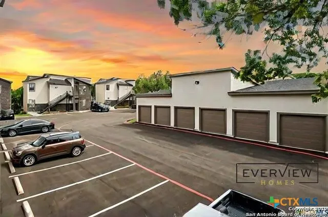 a view of a street with cars