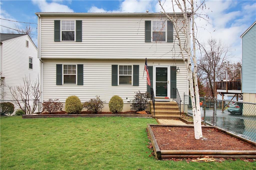 49 Spring Hill Avenue Norwalk, CT 06850 - Photo 1 of 1 a front view of a house with garden