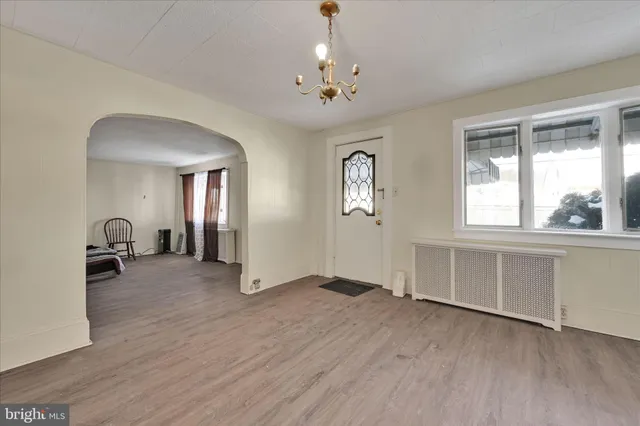 a kitchen with stainless steel appliances cabinets a window and a sink