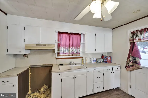 a view of a hallway with workspace