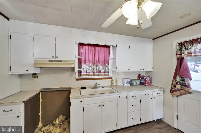 a view of a hallway with workspace