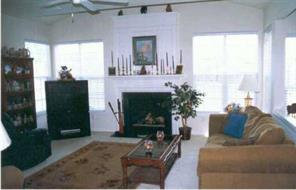 338 Matthews Estates Road Matthews, NC 28105 - Photo 2 of 7 a living room with furniture and a fireplace