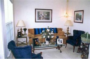 338 Matthews Estates Road Matthews, NC 28105 - Photo 5 of 7 a living room with furniture and a lamp
