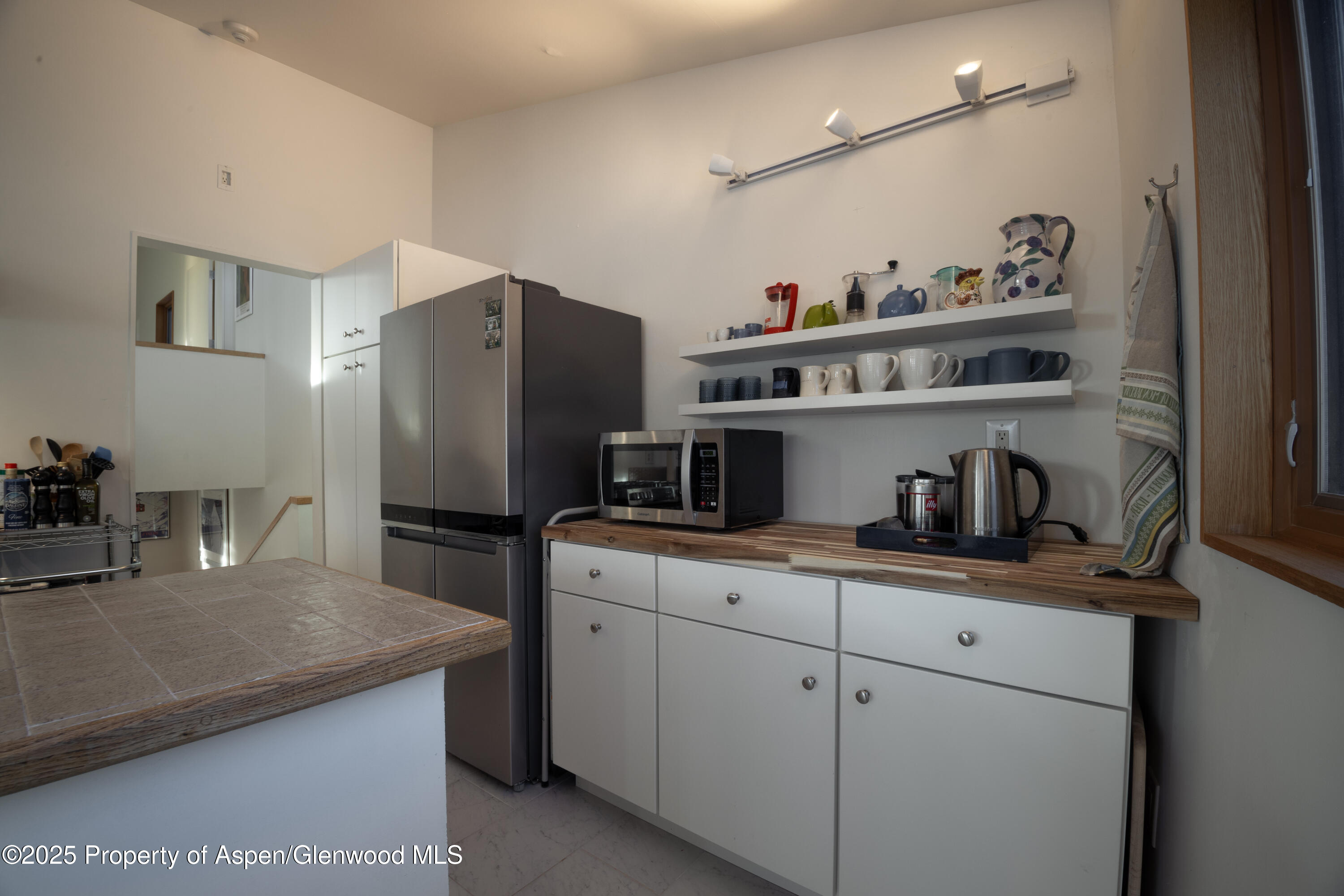 623 Johnson Drive Aspen, CO 81612 - Photo 15 of 35 a kitchen with cabinets stainless steel appliances and a sink